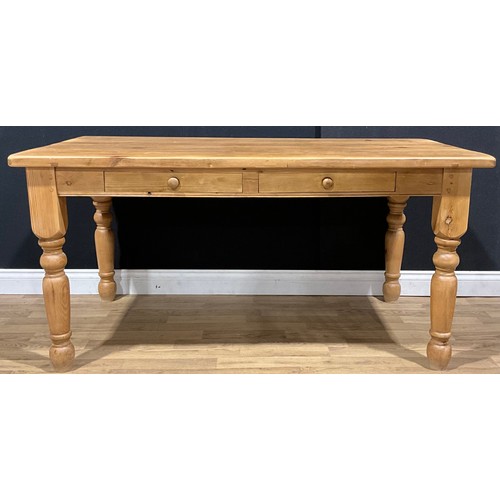 316 - A Victorian style pine farmhouse table, rectangular top above a pair of frieze drawers, turned legs,... 