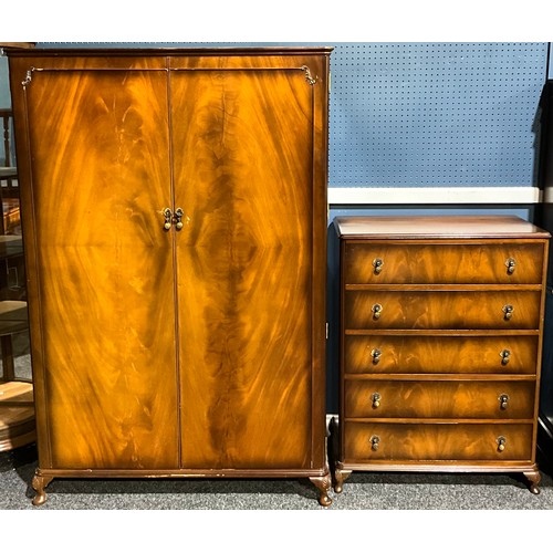 341 - A two-piece bedroom suite, comprising wardrobe, 186cm high, 126cm wide, 58cm deep and chest of five ... 