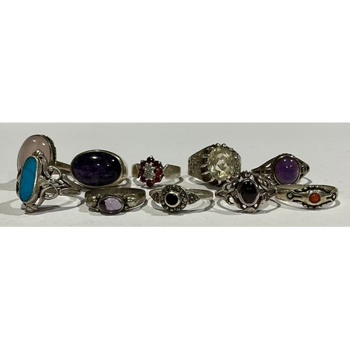 254 - A selection of silver rings, ten in total to include; three Amethyst rings, a Rose Quartz ring and a... 