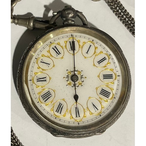 555 - A late 19th century continental lady's silver open face pocket watch, white enamel dial, Roman numer... 