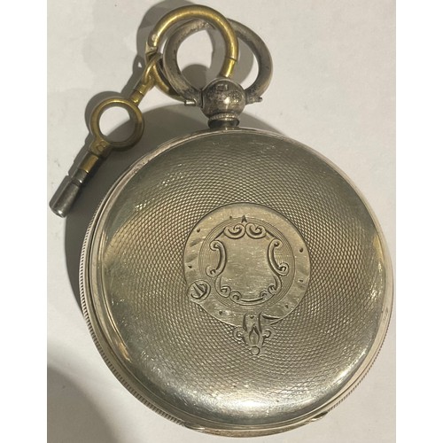 559 - A Victorian silver open face pocket watch, engine turned case and silvered dial, Roman numerals in r... 