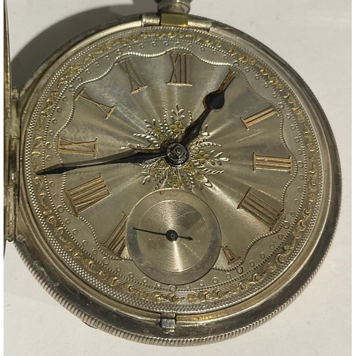 559 - A Victorian silver open face pocket watch, engine turned case and silvered dial, Roman numerals in r... 