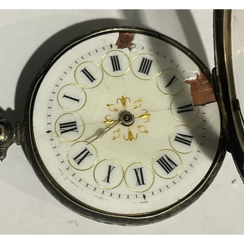 560 - A late 19th century continental lady's silver open face pocket watch, white enamel dial, Roman numer... 