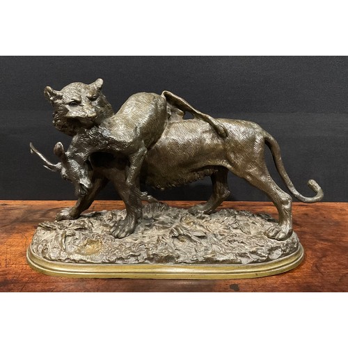 268 - Christopher Fratin (1801-1864), a brown patinated bronze, Big Cat with Kill, standing on naturalisti... 