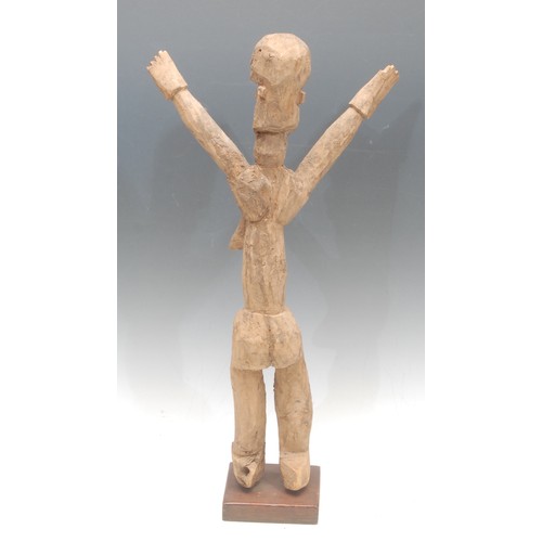 3767 - Tribal Art - a Lobi bateba figure, depicted with arms outsretched upwards, 48cm high, Burkina Faso, ... 