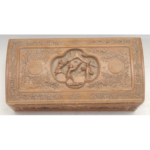 3061 - A Chinese sandalwood rectangular box, hinged domed cover, carved overall in the Cantonese taste, 22c... 