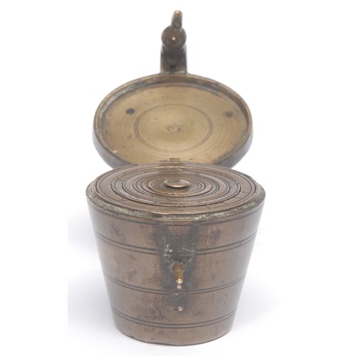 3725 - A set of Nuremburg bronze nesting cup weights, 4.5cm high overall, 18th/19th century