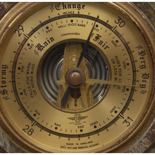 3073 - A Cornish serpentine aneroid barometer, 23cm diam, mid-20th century