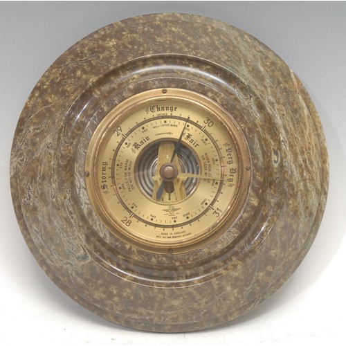 3073 - A Cornish serpentine aneroid barometer, 23cm diam, mid-20th century