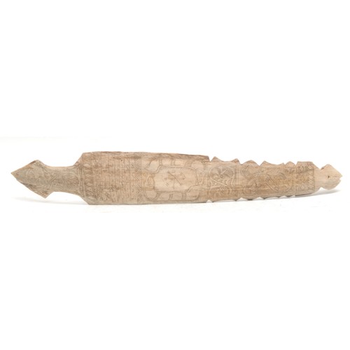 3036 - A Batak bone calendar, scrimshaw decorated, 29.5cm long, Sumatra, Indonesia, early 20th century