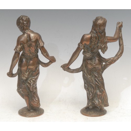 3565 - An Art Nouveau figural bronze, as a scantily dressed maiden, 23cm high; another similar (2)