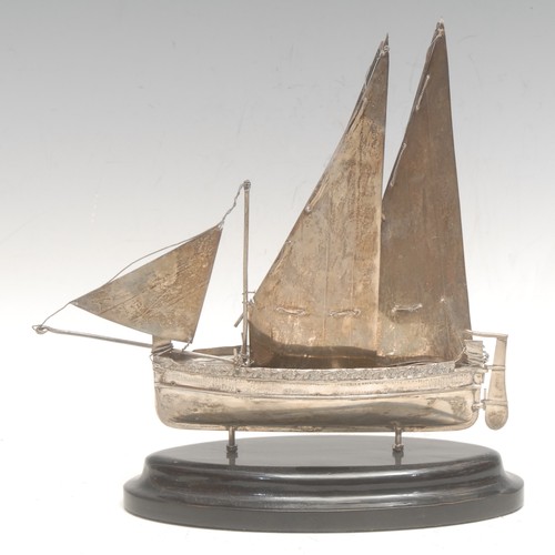 3669 - An early 20th century Maltese 925 silver model, of a sailing boat or luzzu, mounted for display, 20c... 