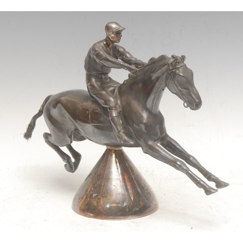 3670 - An early 20th century silver plated car mascot, of a jockey and horse, 19cm high, 25cm long