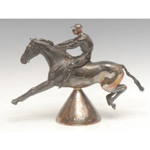 3670 - An early 20th century silver plated car mascot, of a jockey and horse, 19cm high, 25cm long