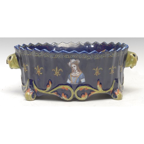 3599 - A 19th century French faience jardinière, the sides hand-painted with a portrait bust of Joan of Arc... 