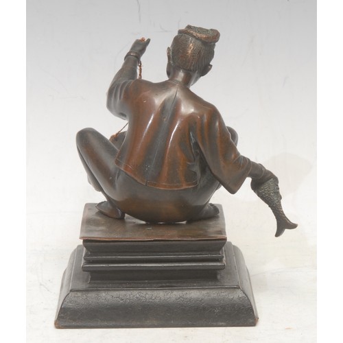 3551 - A 19th century South East Asian bronze, of a fisher-boy weighing his catch, moulded hardwood base, 1... 