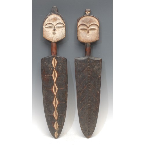 3773 - Tribal Art - a pair of West African Sogo Tsogho boundary markers, 58cm high, Gabon