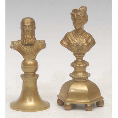 3552 - A bronze cabinet bust, of a Prussian officer, pedestal base, 10cm high overall; another, a lady (2)