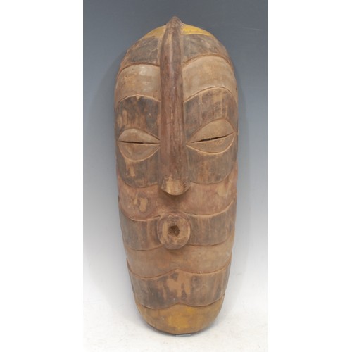 3760 - Tribal Art - a Baule mask, concave profile, pursed lips, horizontal pattern painted in alternating t... 
