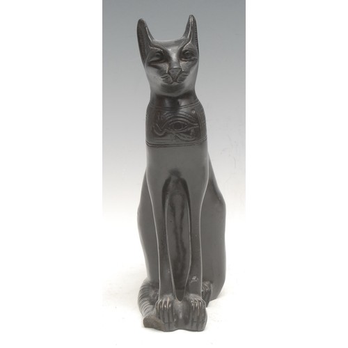 3570 - An Egyptian figural bronze, of King Ramses, onyx base, 25cm high overall; a composite cast, as a lio... 