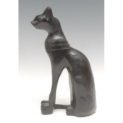 3570 - An Egyptian figural bronze, of King Ramses, onyx base, 25cm high overall; a composite cast, as a lio... 