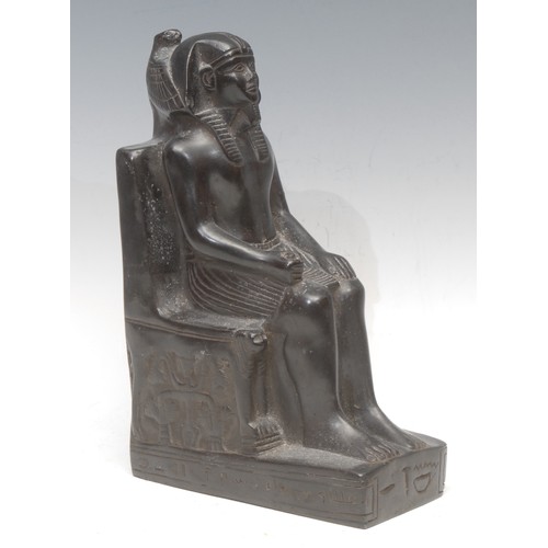 3048 - A bronzed metal figure, King Thutmosis III as a sphinx, after the Egyptian, rectangular base, 26cm l... 