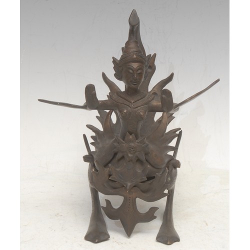 3560 - A Thai bronze figurine, cast as the Buddhist goddess Kinnara, she stands typically as half woman, ha... 