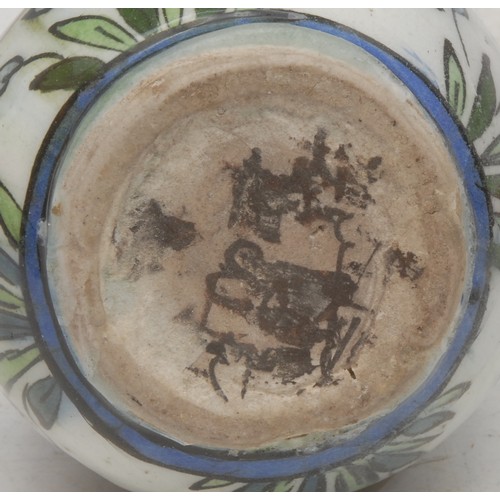 3601 - A 19th century Persian stoneware vase, painted with an onager and antelope among flora, in the Iznik... 