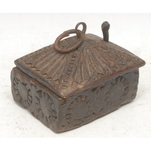 3249 - An 18th/19th century Indian hardwood spice box, primitively carved with geometric patterns, the sarc... 