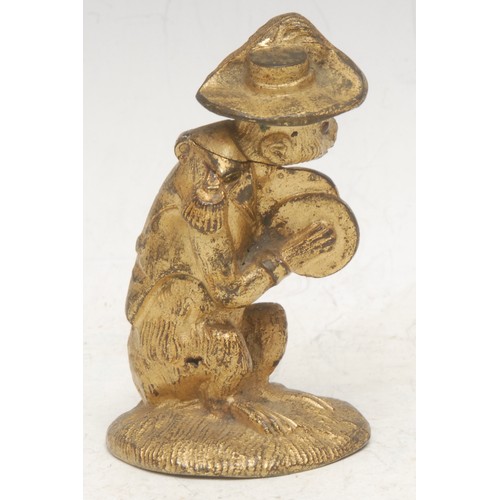 3540 - A 19th century gilt metal novelty table vesta, ccast as a monkey dressed in a Napoleonic military un... 