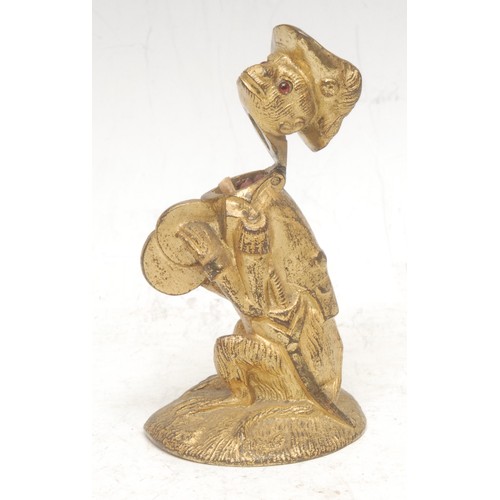 3540 - A 19th century gilt metal novelty table vesta, ccast as a monkey dressed in a Napoleonic military un... 