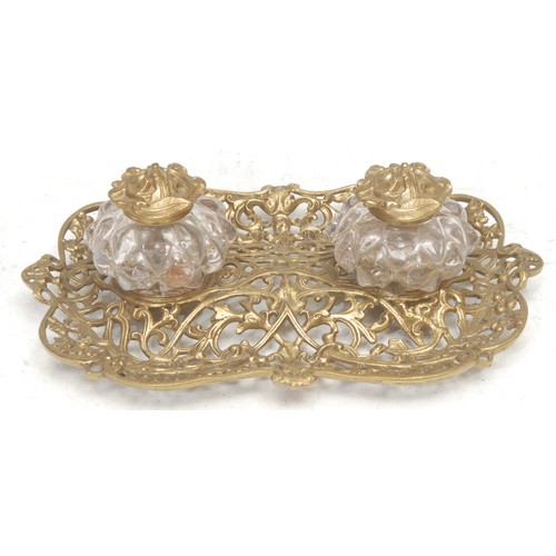 3539 - A 19th century gilt metal inkstand, cast throughout in the Rococo taste with scrolls and diaper pane... 