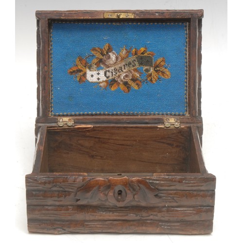 3038 - A Black Forest combination cigar box and desk clock, the 5cm dial set within a branch carried by a b... 