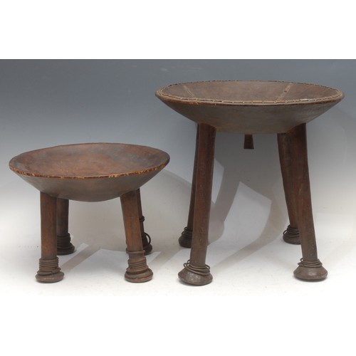 3764 - Tribal Art - a Kamba stool, dished circular top, copper mounted with geometric borders, outswept leg... 