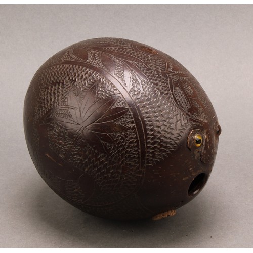 3021A - A 19th century sailor’s bugbear coconut flask, carved with a Naval anchor, flora, fauna and initials... 