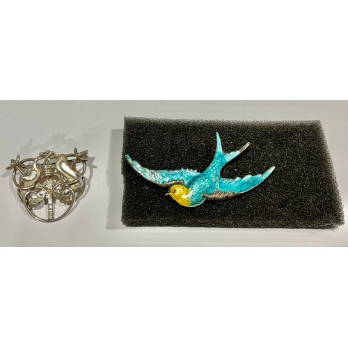 762 - A Vintage Ola Marie Gorie Scottish Silver Tree of Life Brooch and a sterling silver enamelled Swallo... 