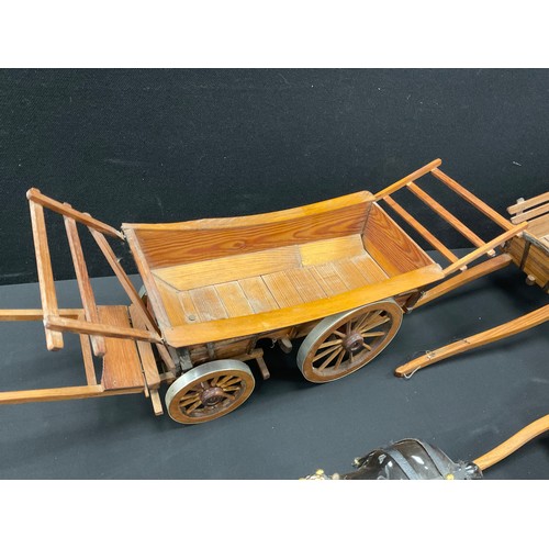 25 - A Scratch built wooden model of a Welsh Long Cart, 61cm long;  others, hay cart/waggons, 75cm long a... 