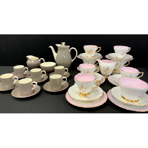 75 - A Wedgwood cream and mushroom grey coffee set for six;  Sutherland Wheat pattern tea set, for eight,... 