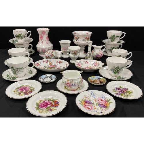 63 - A collection of Fenton china including; a set of eight tea cups and saucers, trinket dishes, vases; ... 