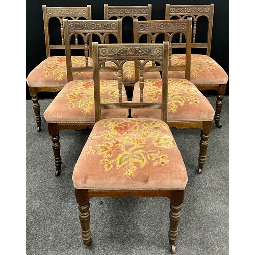 128 - A set of six Arts and Crafts period dining chairs, in the manner of Gillows in the Bruce Talbert tas... 