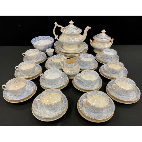 80 - A 19th century Staffordshire Willow pattern blue and white tea set, for twelve, including teapot, su... 