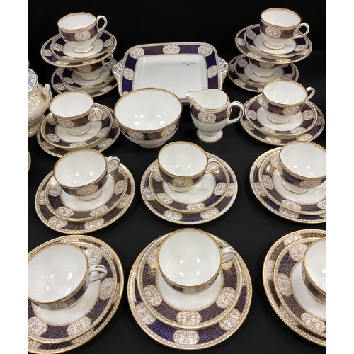 81 - Wedgwood  cobalt blue and gilt, pattern W1150 tea service for twelve comprised of; two picnic plates... 