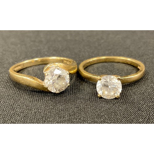 330 - A 14ct gold Cz solitaire ring, stamped QVC 585, size L/M, another similar size M/N, 5.7g gross (2)