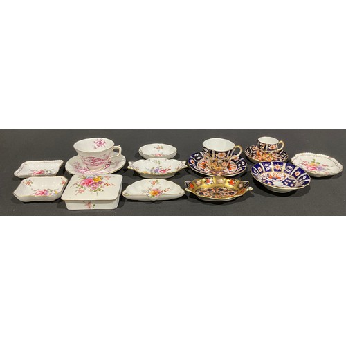 71 - A Royal Crown Derby Imari 2451 pattern teacup and saucer, coffee can and saucer, trinket dish; a Pin... 