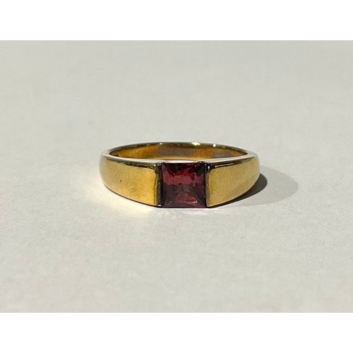 312 - A 9ct Gold Pyrope/Almandine Garnet Ring
the ring is set with a princess cut pyrope/almandine garnet ... 