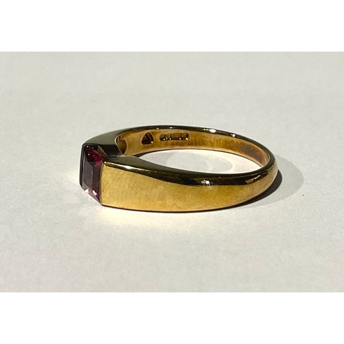 312 - A 9ct Gold Pyrope/Almandine Garnet Ring
the ring is set with a princess cut pyrope/almandine garnet ... 