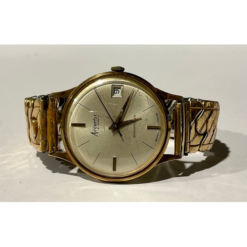 318 - A Gentleman's Accurist 21 Jewels Shockmaster 9ct Gold wristwatch with gold plated stretchable bracel... 