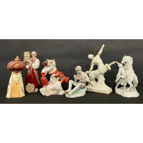 366 - A Herend porcelain model, of a Cossack with rearing horse, in white, 25cm high,a/f; a Zsolnay model,... 