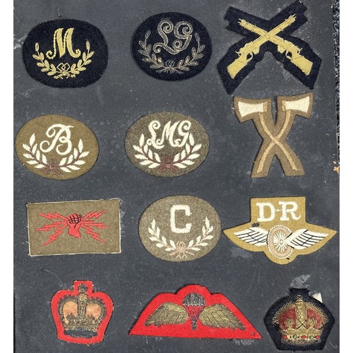 5171 - British Army Cloth Trade, Qualification and Rank Insignia. 28 items fixed to a display board. Includ... 