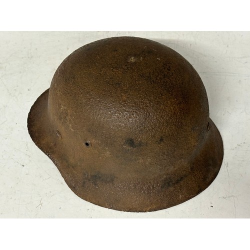 5249 - WW2 Third Reich Heer M40 Steel Helmet in relic condition. Retains most of the liner band. Rust pitte... 